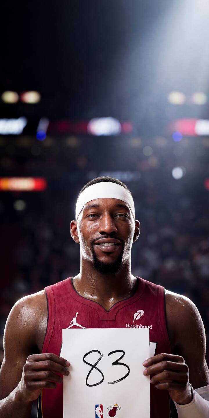This wallpaper features Bam Adebayo wearing a white headband and red basketball jersey while holding a card with the number 83. The wallpaper shows a close-up portrait with arena lighting and a sports atmosphere, making it a strong iPhone sports wallpaper. | basketball player athlete nba player 4k wallpaper iphone wallpaper mobile wallpaper sports wallpaper red jersey arena lighting bam adebayo bam adebayo wallpaper headband player basketball portrait This wallpaper features Bam Adebayo wearing a white headband and red basketball jersey while holding a card with the number 83. The wallpaper shows a close-up portrait with arena lighting and a sports atmosphere, making it a strong iPhone sports wallpaper.