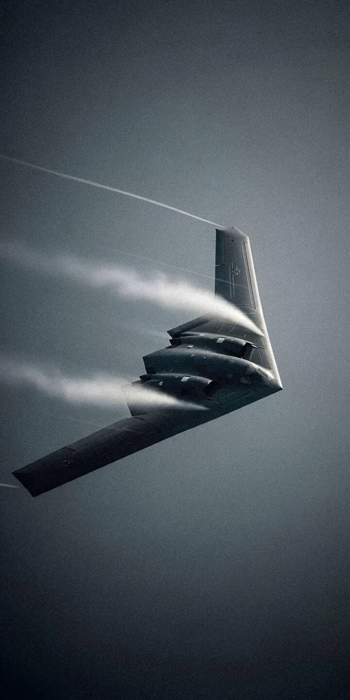 Download this striking B-2 Spirit 4K wallpaper for your iPhone, showcasing contrails and its stealthy silhouette against a moody, atmospheric sky. This wallpaper captures the essence of modern military aviation. | iphone airplane mobile bomber aircraft 4k wallpaper hd wallpaper military aviation stealth bomber b-2 spirit contrails Download this striking B-2 Spirit 4K wallpaper for your iPhone, showcasing contrails and its stealthy silhouette against a moody, atmospheric sky. This wallpaper captures the essence of modern military aviation.