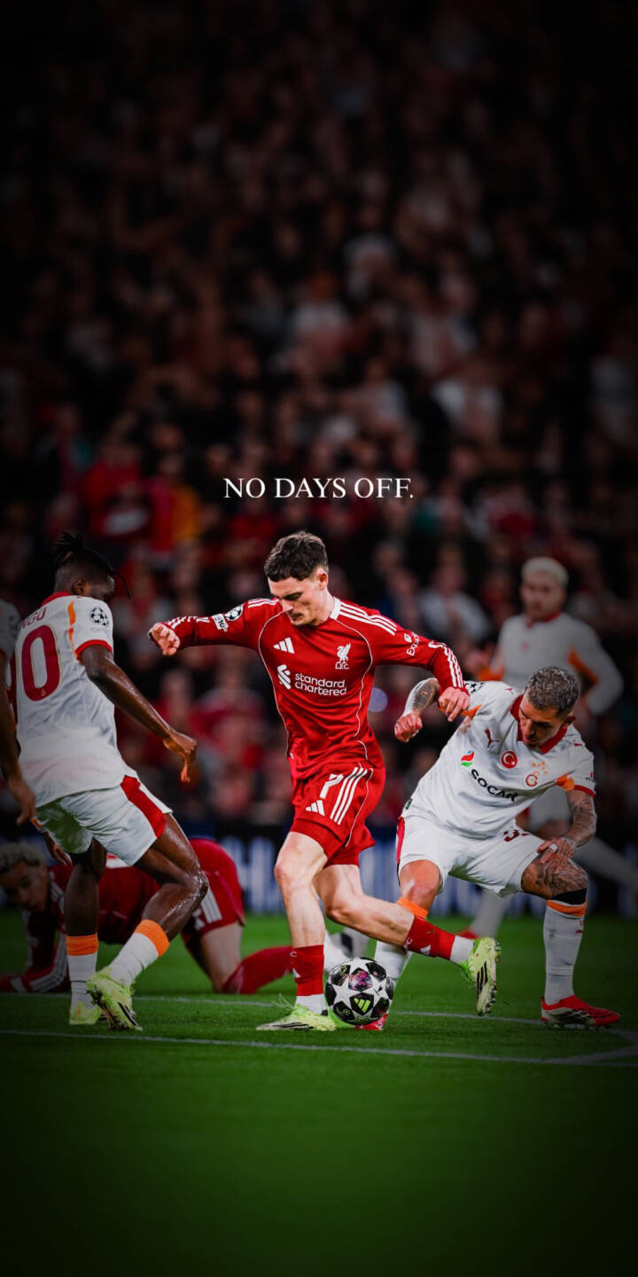 Download this wirtz wallpaper in 4K for your iPhone to showcase your love for soccer. This wallpaper features the Liverpool player in action, wearing his red jersey and matching shorts, against opponents in white and orange. | football iphone soccer premier league liverpool mobile 4k wallpaper hd wallpaper no days off wirtz Download this wirtz wallpaper in 4K for your iPhone to showcase your love for soccer. This wallpaper features the Liverpool player in action, wearing his red jersey and matching shorts, against opponents in white and orange.