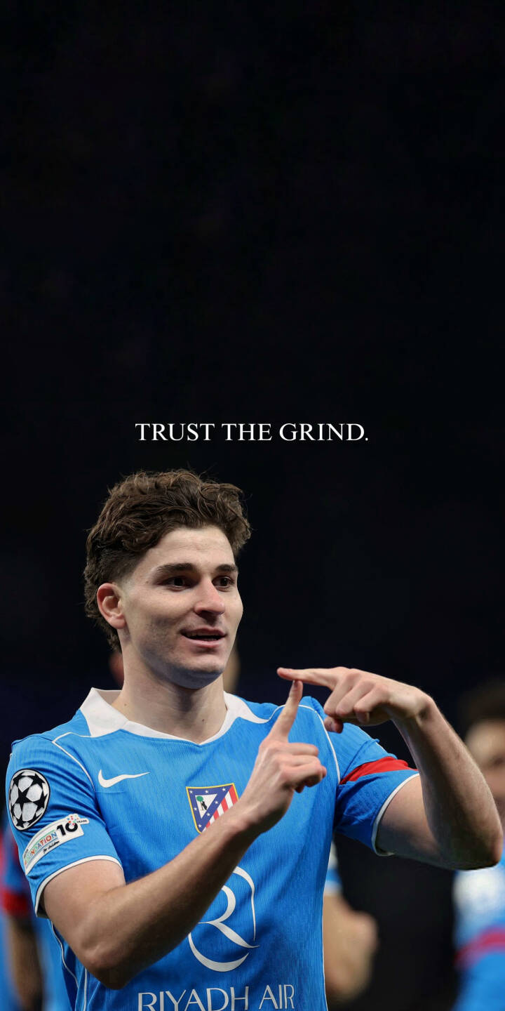 Get this Rodrigo De Paul wallpaper in crisp 4K for your iPhone! This wallpaper features the soccer player in his Atletico Madrid jersey, pointing up, with the words "TRUST THE GRIND." | football iphone soccer soccer player mobile Alvarez 4k wallpaper hd wallpaper atletico madrid argentine trust the grind Get this Rodrigo De Paul wallpaper in crisp 4K for your iPhone! This wallpaper features the soccer player in his Atletico Madrid jersey, pointing up, with the words "TRUST THE GRIND."