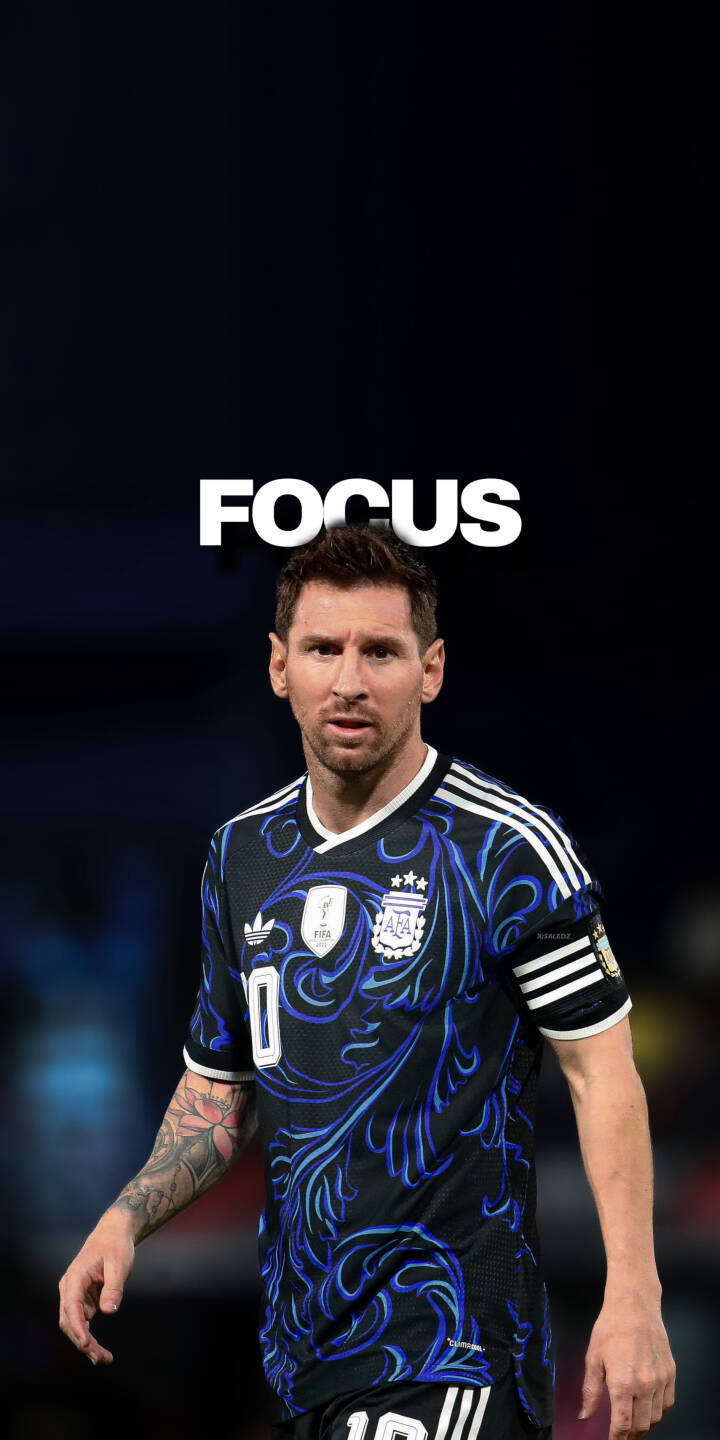 Elevate your iPhone with this stunning Lionel Messi 4K wallpaper, featuring the legendary player in his unique black Argentina jersey adorned with intricate blue swirl patterns and the prominent 'FOCUS' overlay. This high-definition wallpaper beautifully showcases his intense gaze and detailed arm tattoos, perfect for any football enthusiast. | football focus iphone messi argentina soccer jersey lionel messi mobile 4k wallpaper hd wallpaper number 10 Elevate your iPhone with this stunning Lionel Messi 4K wallpaper, featuring the legendary player in his unique black Argentina jersey adorned with intricate blue swirl patterns and the prominent 'FOCUS' overlay. This high-definition wallpaper beautifully showcases his intense gaze and detailed arm tattoos, perfect for any football enthusiast.