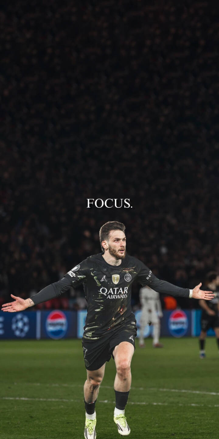 Immerse yourself in the intensity of the game with this striking kvaratskhelia 4K wallpaper, perfectly optimized for your iPhone. This dynamic wallpaper captures Fabian Ruiz celebrating on the field in his dark PSG jersey, with the motivational word "FOCUS." subtly overlayed against a blurred stadium backdrop. | sports football focus celebration iphone soccer psg mobile paris saint-germain 4k wallpaper hd wallpaper kvaratskhelia Immerse yourself in the intensity of the game with this striking kvaratskhelia 4K wallpaper, perfectly optimized for your iPhone. This dynamic wallpaper captures Fabian Ruiz celebrating on the field in his dark PSG jersey, with the motivational word "FOCUS." subtly overlayed against a blurred stadium backdrop.