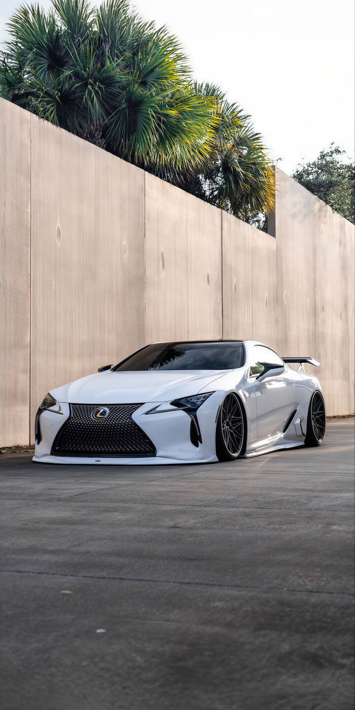 This stunning 4K wallpaper features a custom white Lexus LC 500, showcasing its aggressive slammed stance and intricate dark multi-spoke wheels, making it a perfect iPhone wallpaper for car enthusiasts. | sports car iphone mobile luxury car lexus white car 4k wallpaper hd wallpaper custom car lexus lc 500 lc500 slammed car This stunning 4K wallpaper features a custom white Lexus LC 500, showcasing its aggressive slammed stance and intricate dark multi-spoke wheels, making it a perfect iPhone wallpaper for car enthusiasts.