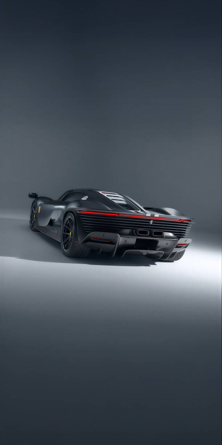 Elevate your iPhone with this stunning Ferrari Daytona SP3 4K wallpaper, showcasing the sleek black sports car with its distinctive red horizontal taillight bar and aggressive rear diffuser. This premium 4K wallpaper beautifully captures the car's dynamic design against a minimalist grey background. | sports car iphone ferrari supercar black car mobile luxury car 4k wallpaper hd wallpaper automotive exotic car ferrari daytona sp3 Elevate your iPhone with this stunning Ferrari Daytona SP3 4K wallpaper, showcasing the sleek black sports car with its distinctive red horizontal taillight bar and aggressive rear diffuser. This premium 4K wallpaper beautifully captures the car's dynamic design against a minimalist grey background.