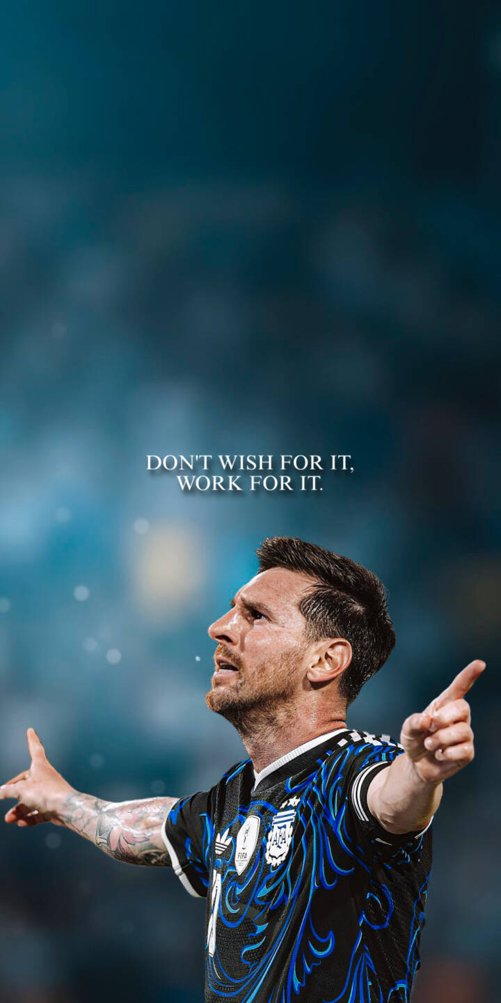 Elevate your iPhone screen with this stunning Lionel Messi 4K wallpaper, featuring the football legend celebrating in his iconic black and blue patterned Argentina jersey, accompanied by the powerful message "DON'T WISH FOR IT, WORK FOR IT." This high-resolution wallpaper captures Messi's determined spirit against a serene blurred blue background, making it the perfect motivational backdrop for any fan. | sports football motivational iphone messi argentina soccer lionel messi mobile 4k wallpaper hd wallpaper leo messi Elevate your iPhone screen with this stunning Lionel Messi 4K wallpaper, featuring the football legend celebrating in his iconic black and blue patterned Argentina jersey, accompanied by the powerful message "DON'T WISH FOR IT, WORK FOR IT." This high-resolution wallpaper captures Messi's determined spirit against a serene blurred blue background, making it the perfect motivational backdrop for any fan.