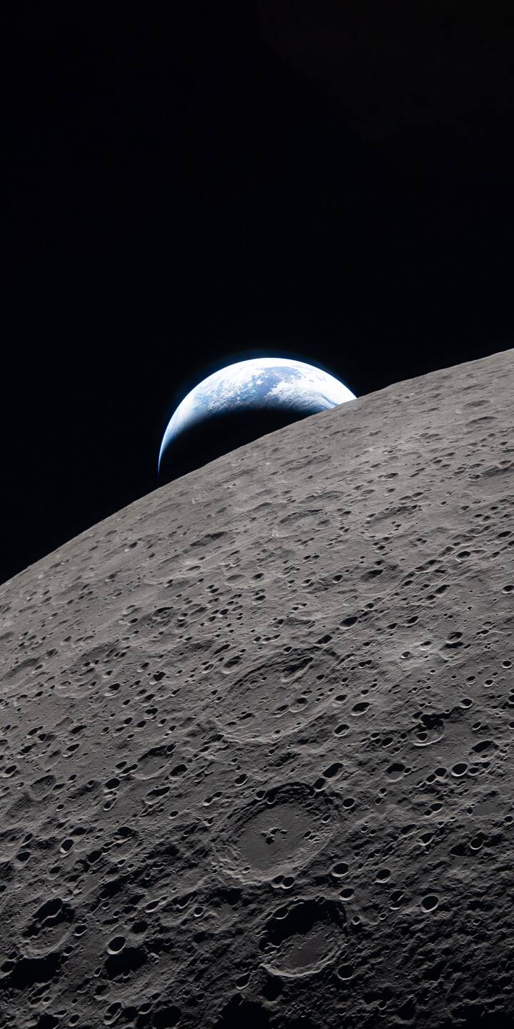 Witness the iconic Earthrise 4K wallpaper, featuring our beautiful blue planet peeking over the heavily cratered lunar surface against the dark expanse of space. This breathtaking wallpaper is perfectly optimized for your iPhone, bringing a stunning cosmic view to your device. | moon space earth iphone nasa mobile 4k wallpaper hd wallpaper astronomy cosmos crater earthrise Witness the iconic Earthrise 4K wallpaper, featuring our beautiful blue planet peeking over the heavily cratered lunar surface against the dark expanse of space. This breathtaking wallpaper is perfectly optimized for your iPhone, bringing a stunning cosmic view to your device.