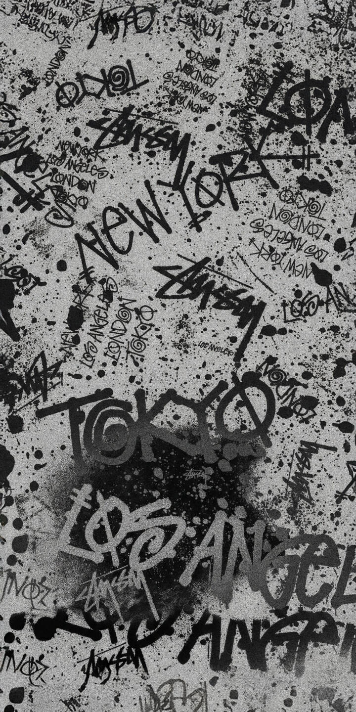 Elevate your device with this striking Stussy Graffiti City 4K wallpaper, perfect for personalizing your iPhone. This unique wallpaper features bold black and white graffiti text, prominent city names like New York and Tokyo, and dynamic paint splatters, offering an edgy urban aesthetic. | urban street art new york los angeles iphone tokyo black and white graffiti mobile 4k wallpaper hd wallpaper stussy Elevate your device with this striking Stussy Graffiti City 4K wallpaper, perfect for personalizing your iPhone. This unique wallpaper features bold black and white graffiti text, prominent city names like New York and Tokyo, and dynamic paint splatters, offering an edgy urban aesthetic.