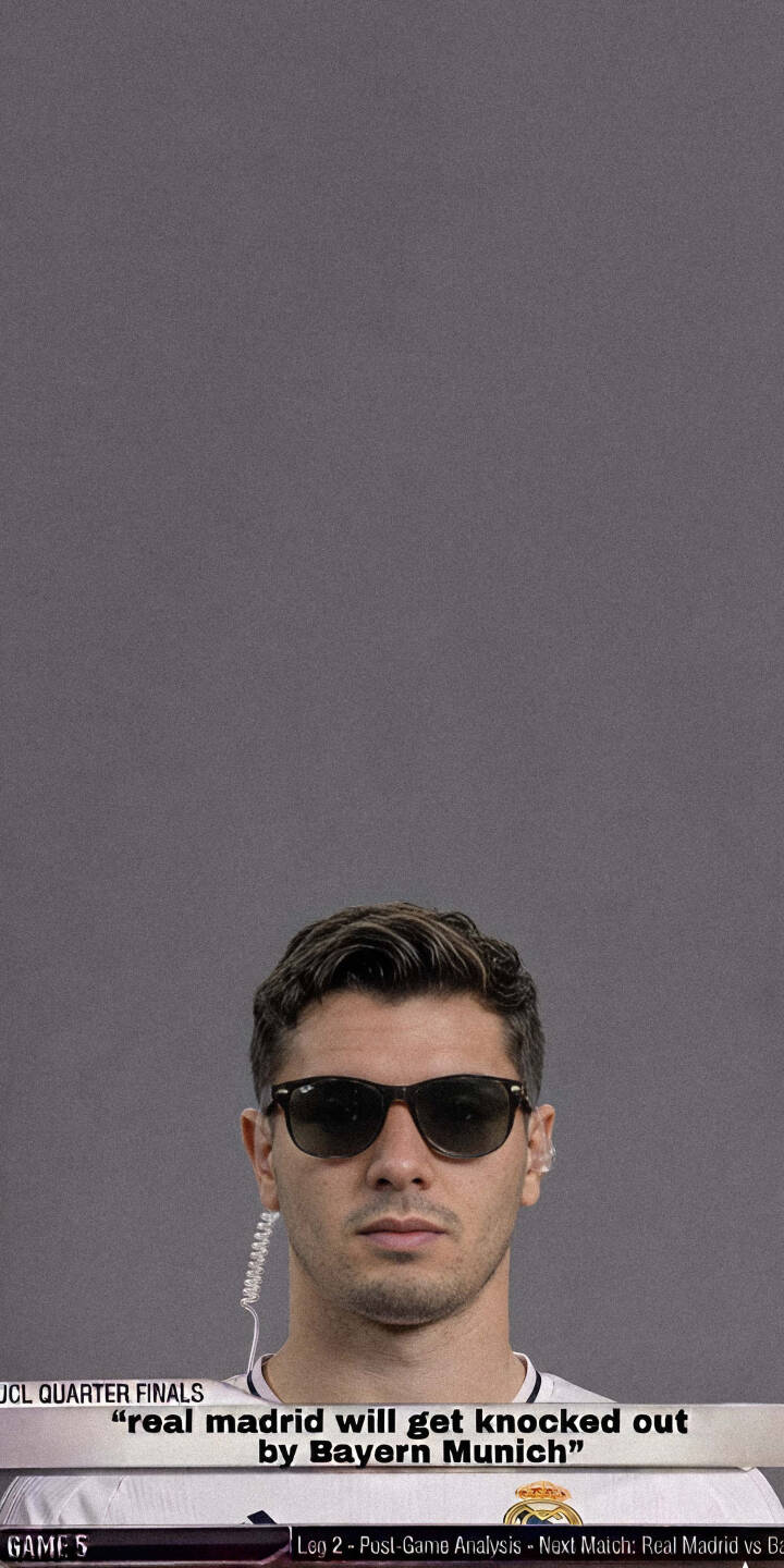 Federico Valverde's stern gaze behind classic dark sunglasses, coupled with his discrete earpiece, creates an undercover agent vibe in this intriguing 4K wallpaper — a must-have iPhone wallpaper for fans of Real Madrid and football suspense. | football sunglasses iphone soccer real madrid wallpaper agent mobile 4k wallpaper hd wallpaper valverde federico valverde Federico Valverde's stern gaze behind classic dark sunglasses, coupled with his discrete earpiece, creates an undercover agent vibe in this intriguing 4K wallpaper — a must-have iPhone wallpaper for fans of Real Madrid and football suspense.