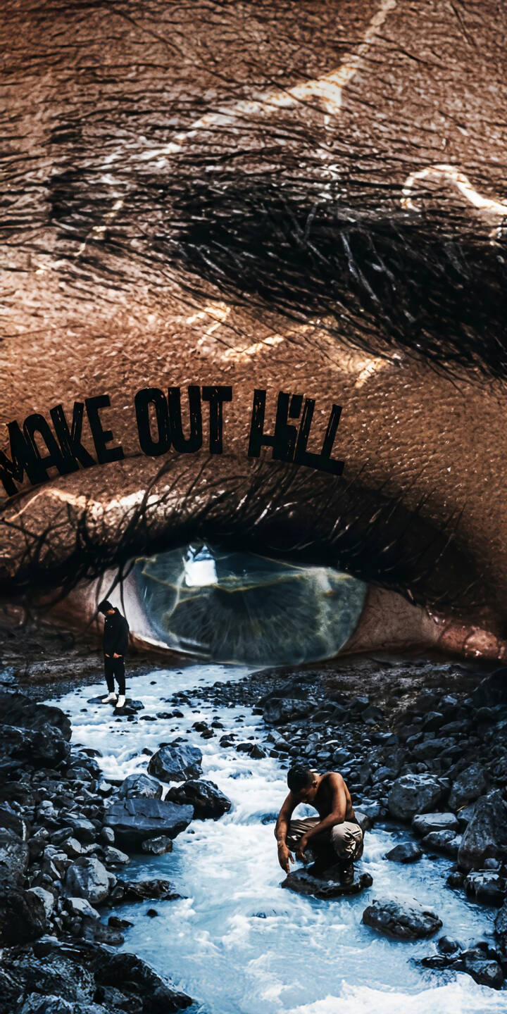 The striking giant eye featuring 'SMOKE OUT HILL' text artfully frames a surreal landscape where a river winds through rocky terrain with small figures within; this XXXTENTACION 4K wallpaper is a captivating choice for your iPhone and makes a unique mobile wallpaper. | music dark xxxtentacion iphone wallpaper mobile 4k wallpaper hd wallpaper surreal album art jahseh onfroy smoke out hill The striking giant eye featuring 'SMOKE OUT HILL' text artfully frames a surreal landscape where a river winds through rocky terrain with small figures within; this XXXTENTACION 4K wallpaper is a captivating choice for your iPhone and makes a unique mobile wallpaper.