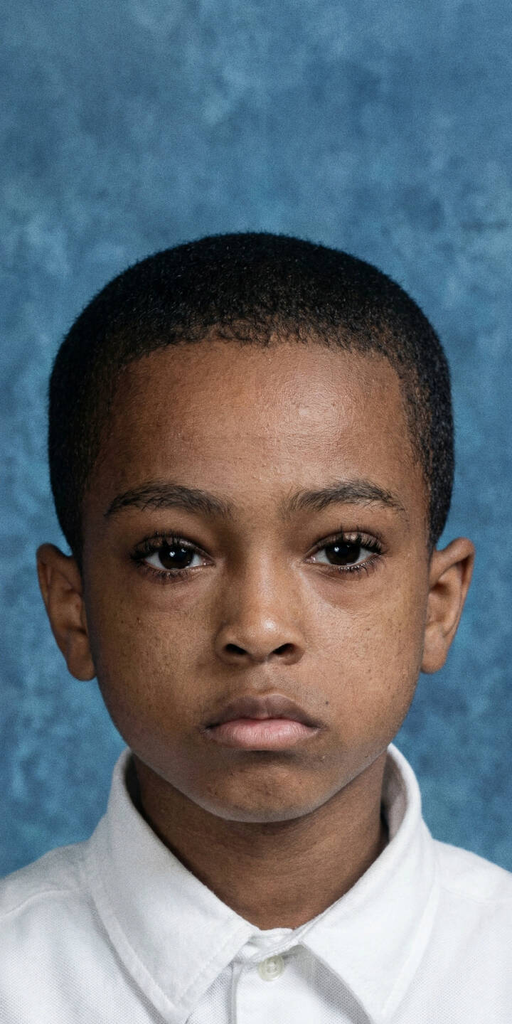 A serious young XXXTentacion is captured in a classic school portrait against a textured blue background in this compelling 4K wallpaper, an ideal wallpaper for your iPhone. | rapper portrait xxxtentacion iphone wallpaper x young mobile 4k wallpaper hd wallpaper blue background jahseh onfroy A serious young XXXTentacion is captured in a classic school portrait against a textured blue background in this compelling 4K wallpaper, an ideal wallpaper for your iPhone.