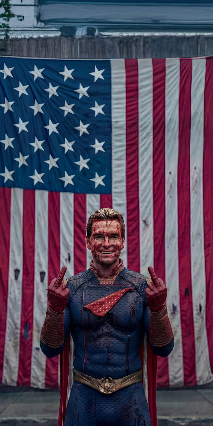 Bloodied Homelander gives a menacing smirk and twin middle fingers, making a defiant statement against a tattered, blood-splattered American flag in this striking 4K wallpaper — an intense wallpaper for iPhone users seeking a bold screen. | the boys superhero blood homelander iphone wallpaper american flag mobile 4k wallpaper hd wallpaper antihero gritty Bloodied Homelander gives a menacing smirk and twin middle fingers, making a defiant statement against a tattered, blood-splattered American flag in this striking 4K wallpaper — an intense wallpaper for iPhone users seeking a bold screen.