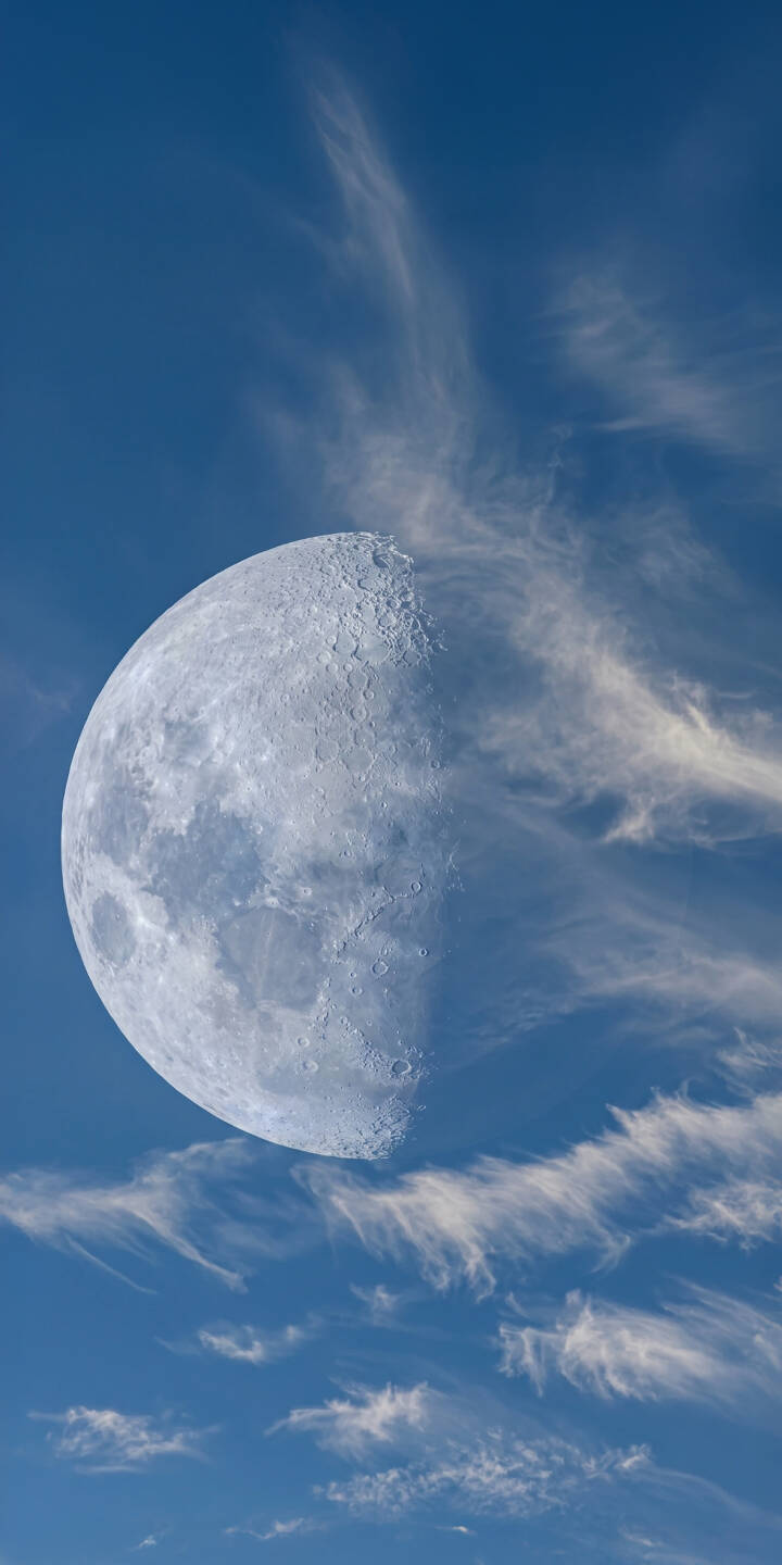 The quarter moon's cratered surface stands out against the serene blue sky and delicate clouds in this stunning 4K wallpaper, making it a captivating visual. Perfect for your iPhone, this celestial wallpaper captures the tranquil beauty of space. | sky moon space iphone nature clouds wallpaper mobile 4k wallpaper hd wallpaper celestial quarter moon The quarter moon's cratered surface stands out against the serene blue sky and delicate clouds in this stunning 4K wallpaper, making it a captivating visual. Perfect for your iPhone, this celestial wallpaper captures the tranquil beauty of space.