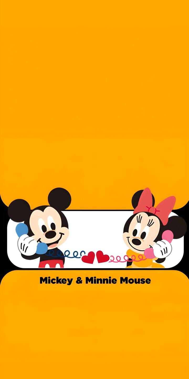 Mickey and Minnie Mouse share a sweet 'love call' across classic corded telephones, with playful hearts forming the connection, in this charming 4K wallpaper perfect for iPhone users. This delightful wallpaper showcases the iconic duo against a vibrant orange background. | couple cartoon disney love cute iphone wallpaper mickey mouse mobile 4k wallpaper hd wallpaper minnie mouse Mickey and Minnie Mouse share a sweet 'love call' across classic corded telephones, with playful hearts forming the connection, in this charming 4K wallpaper perfect for iPhone users. This delightful wallpaper showcases the iconic duo against a vibrant orange background.