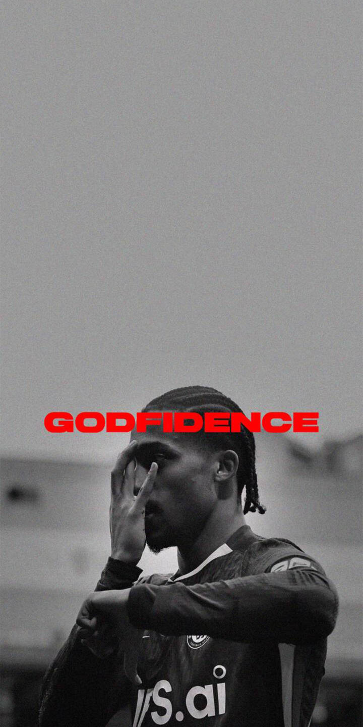 The striking red "GODFIDENC" text stands out dramatically above a pensive athlete with braided hair, his hand subtly covering his face in this powerful black and white 4K wallpaper. This high-definition wallpaper for iPhone captures a mood of focused determination, perfect for sports enthusiasts. | football athlete iphone soccer wallpaper mobile 4k wallpaper hd wallpaper monochrome blackandwhite inspiration godfidence The striking red "GODFIDENC" text stands out dramatically above a pensive athlete with braided hair, his hand subtly covering his face in this powerful black and white 4K wallpaper. This high-definition wallpaper for iPhone captures a mood of focused determination, perfect for sports enthusiasts.