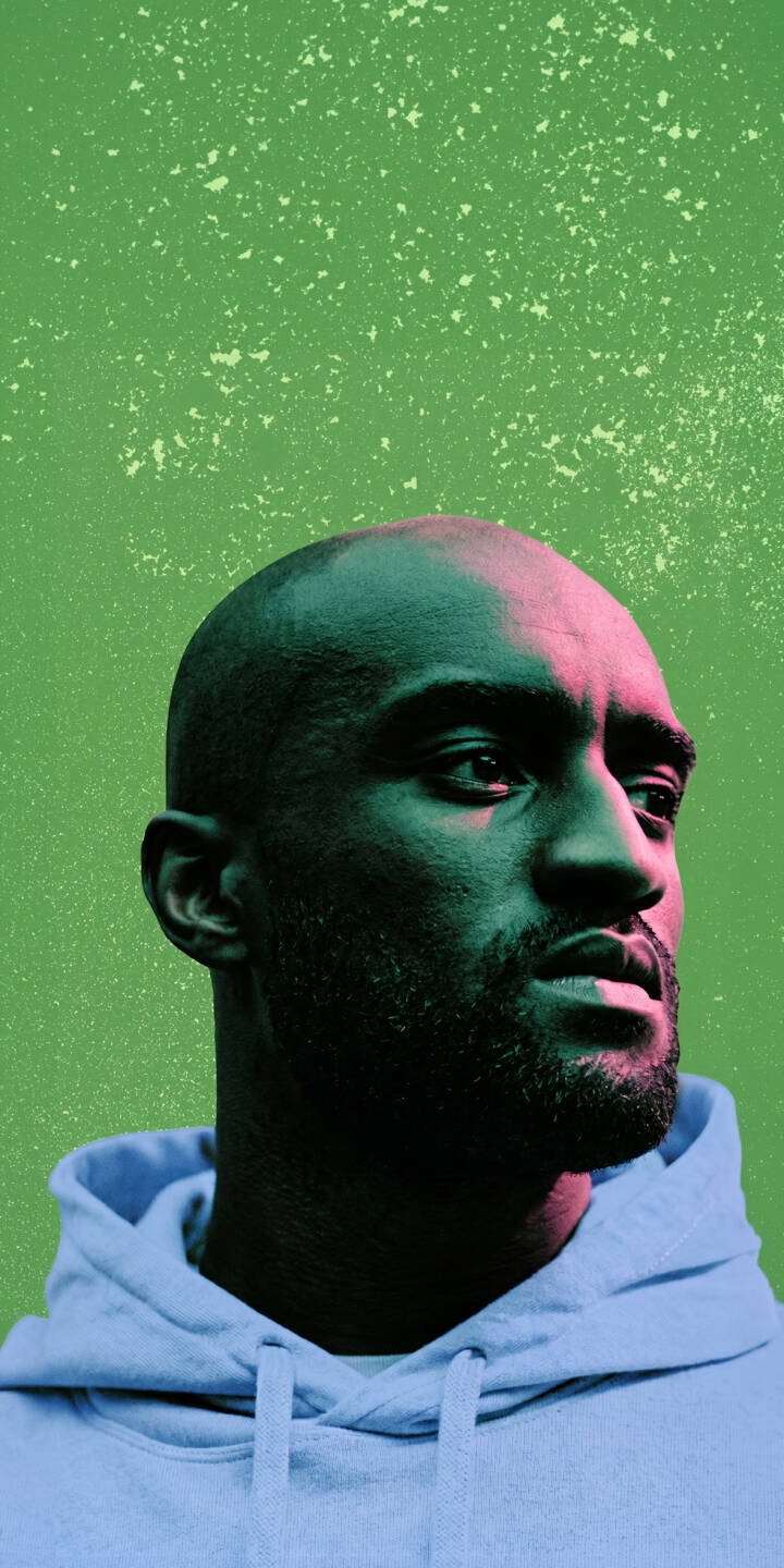 Contrasting pink and teal lighting illuminates Virgil Abloh's thoughtful expression against a speckled green background in this striking 4K wallpaper. This powerful designer wallpaper is perfect for your iPhone, bringing a unique aesthetic to your device. | aesthetic portrait neon iphone wallpaper mobile off white 4k wallpaper hd wallpaper designer virgil abloh Contrasting pink and teal lighting illuminates Virgil Abloh's thoughtful expression against a speckled green background in this striking 4K wallpaper. This powerful designer wallpaper is perfect for your iPhone, bringing a unique aesthetic to your device.