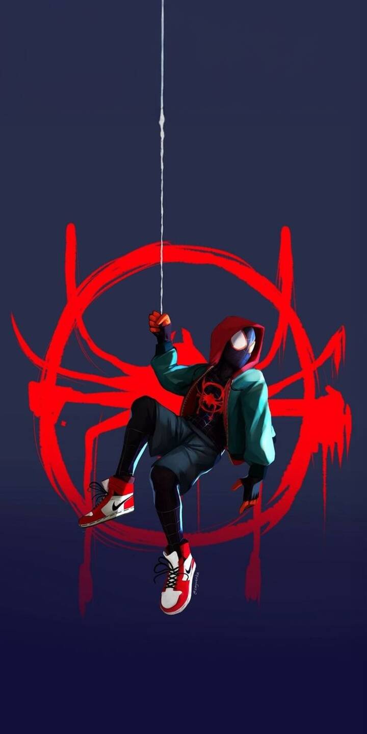 Miles Morales dangles from a web thread, striking a relaxed pose in his signature red hoodie, teal jacket, and iconic red-and-white sneakers against a bold, graffiti-style red spider logo. This dynamic 4K wallpaper offers an urban-cool aesthetic, perfect for an iPhone lock screen. | street art superhero animated iphone wallpaper miles morales mobile 4k wallpaper hd wallpaper jordan shoes spider-verse spider-man Miles Morales dangles from a web thread, striking a relaxed pose in his signature red hoodie, teal jacket, and iconic red-and-white sneakers against a bold, graffiti-style red spider logo. This dynamic 4K wallpaper offers an urban-cool aesthetic, perfect for an iPhone lock screen.