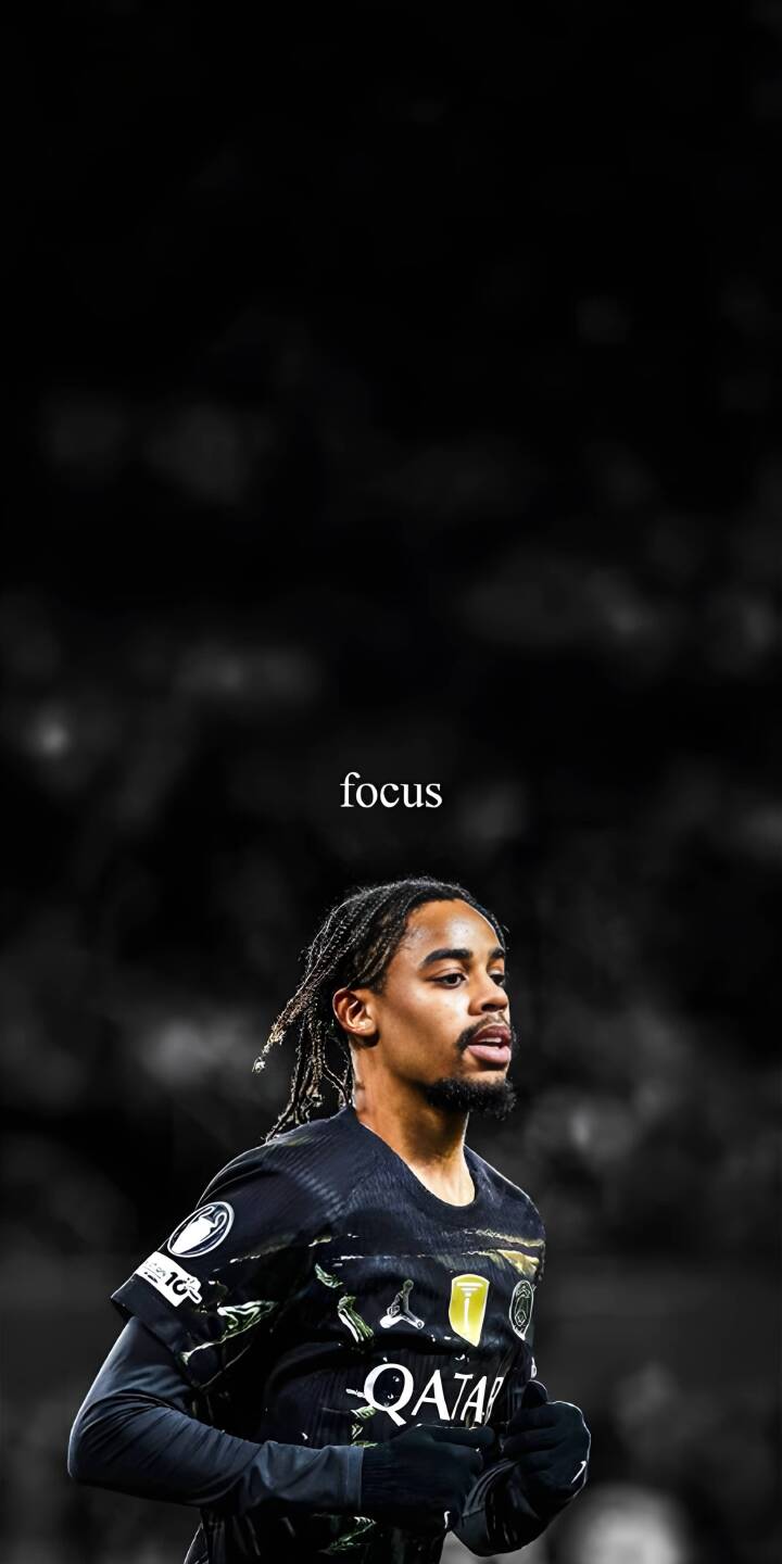 Xavi Simons' intense gaze and the word 'focus' suspended above him encapsulate dedication in this powerful 4K wallpaper, showcasing the Dutch midfielder in his dark PSG kit against a blurred monochrome background. This inspiring football wallpaper is perfect for your iPhone. | sports football athlete focus iphone soccer wallpaper psg mobile xavi simons 4k wallpaper hd wallpaper Xavi Simons' intense gaze and the word 'focus' suspended above him encapsulate dedication in this powerful 4K wallpaper, showcasing the Dutch midfielder in his dark PSG kit against a blurred monochrome background. This inspiring football wallpaper is perfect for your iPhone.
