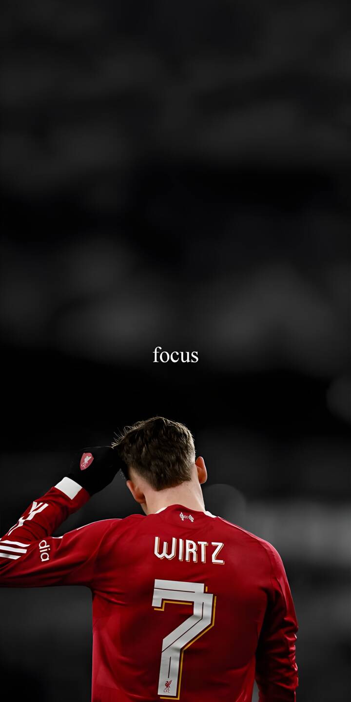 The striking text 'focus' anchors the intense mood as Florian Wirtz, wearing his number 7 red Liverpool jersey, places a contemplative hand on his head in this dynamic 4K wallpaper. This powerful and motivational wallpaper is perfect for any iPhone displaying an athlete's determination. | sports football focus iphone soccer wallpaper mobile florian wirtz 4k wallpaper hd wallpaper red jersey wirtz The striking text 'focus' anchors the intense mood as Florian Wirtz, wearing his number 7 red Liverpool jersey, places a contemplative hand on his head in this dynamic 4K wallpaper. This powerful and motivational wallpaper is perfect for any iPhone displaying an athlete's determination.