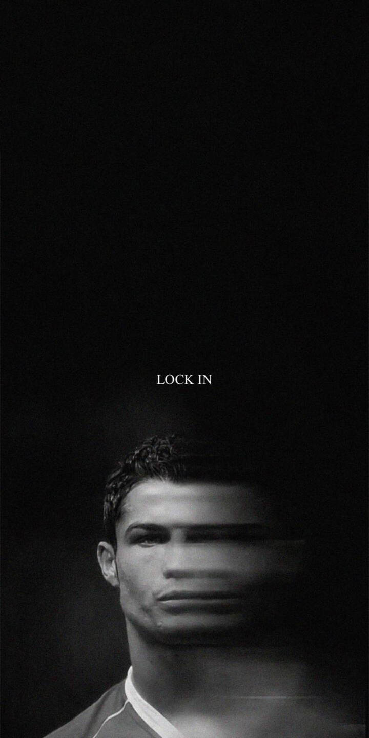 The striking text "LOCK IN" hovers above a monochrome portrait of Cristiano Ronaldo, his face artistically blurred on one side, capturing intense focus in this stunning 4K wallpaper. This captivating minimalist wallpaper is a perfect fit for any iPhone, embodying peak concentration. | iphone ronaldo minimalist wallpaper cr7 black and white cristiano ronaldo mobile lock in 4k wallpaper hd wallpaper glitch art The striking text "LOCK IN" hovers above a monochrome portrait of Cristiano Ronaldo, his face artistically blurred on one side, capturing intense focus in this stunning 4K wallpaper. This captivating minimalist wallpaper is a perfect fit for any iPhone, embodying peak concentration.
