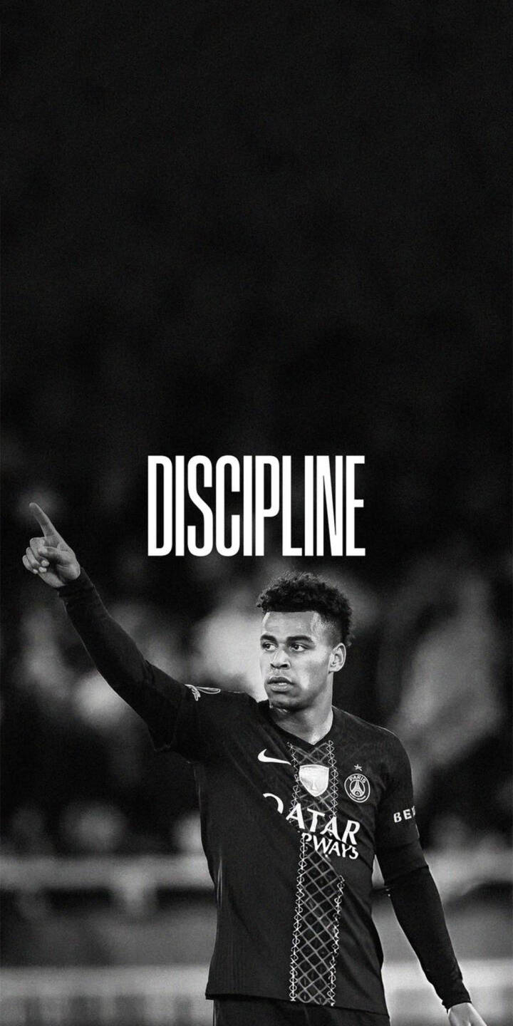The striking black and white portrait of Warren Zaïre-Emery, with the word 'DISCIPLINE' boldly displayed above him, makes for an inspiring 4K wallpaper. This powerful image, featuring the PSG star pointing skyward with a determined expression, is a perfect motivational wallpaper for your iPhone. | football discipline motivational iphone wallpaper psg black and white mobile warren zaïre-emery 4k wallpaper hd wallpaper zaïre-emery The striking black and white portrait of Warren Zaïre-Emery, with the word 'DISCIPLINE' boldly displayed above him, makes for an inspiring 4K wallpaper. This powerful image, featuring the PSG star pointing skyward with a determined expression, is a perfect motivational wallpaper for your iPhone.