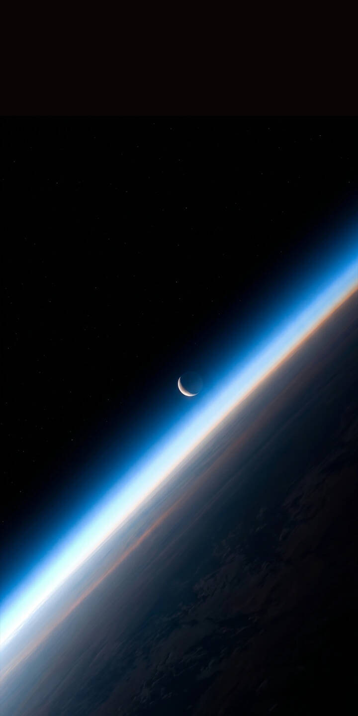 The delicate crescent moon hangs serenely above Earth's glowing atmospheric curve in this breathtaking 4K wallpaper. This stunning space wallpaper, showing the vibrant blue and orange hues of our planet's limb, is a perfect cosmic backdrop for your iPhone. | moon space planet earth iphone wallpaper mobile 4k wallpaper hd wallpaper astronomy cosmos crescent moon The delicate crescent moon hangs serenely above Earth's glowing atmospheric curve in this breathtaking 4K wallpaper. This stunning space wallpaper, showing the vibrant blue and orange hues of our planet's limb, is a perfect cosmic backdrop for your iPhone.