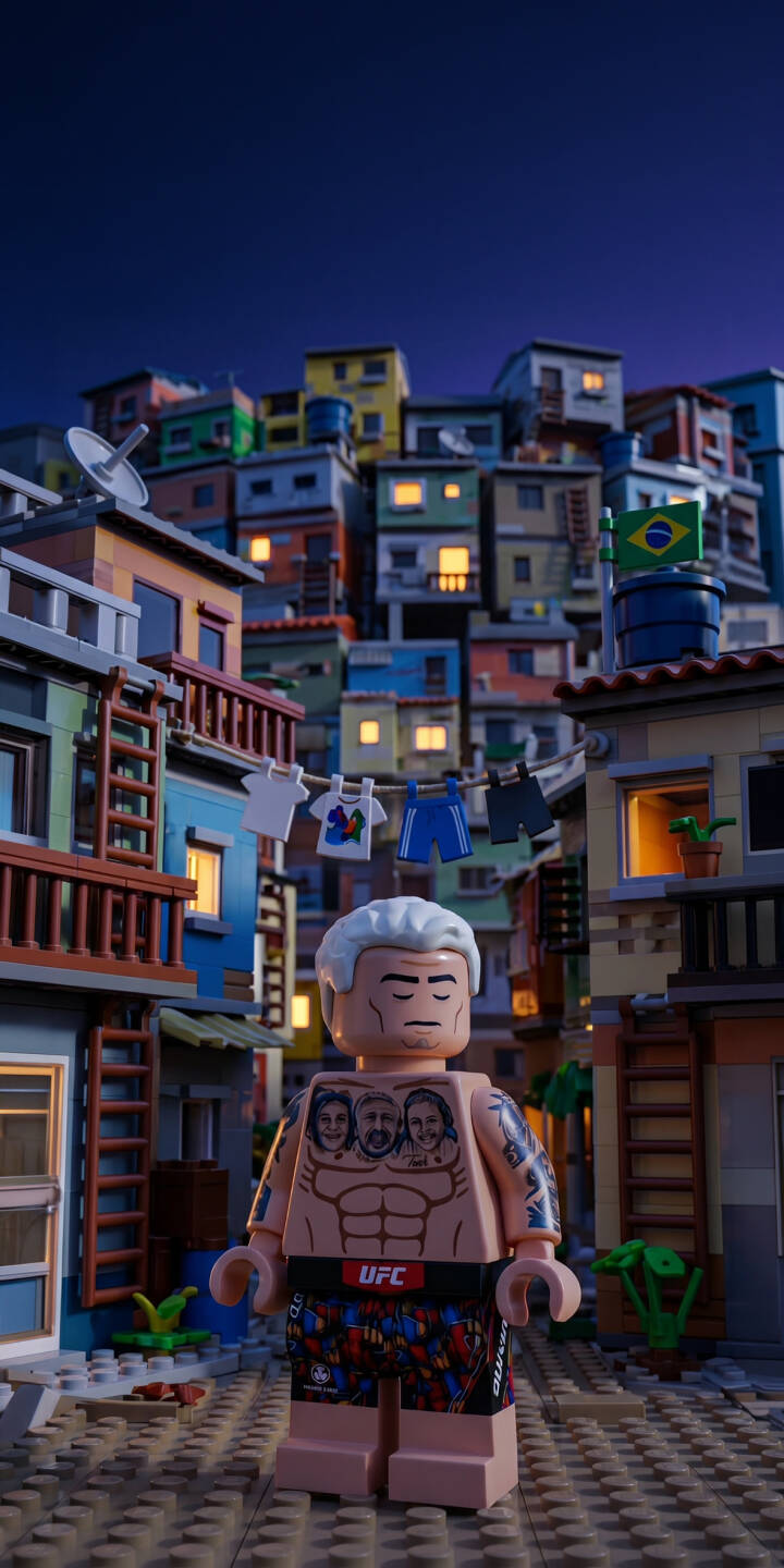 A contemplative Lego minifigure, featuring detailed chest tattoos and UFC shorts, stands against the vibrant backdrop of a sprawling Lego favela with a Brazilian flag in this captivating 4K wallpaper. This unique wallpaper for iPhone perfectly captures the intricate brick-built art style and serene atmosphere. | lego iphone wallpaper mobile ufc 4k wallpaper hd wallpaper brazilian intricate minifigure brick art favela A contemplative Lego minifigure, featuring detailed chest tattoos and UFC shorts, stands against the vibrant backdrop of a sprawling Lego favela with a Brazilian flag in this captivating 4K wallpaper. This unique wallpaper for iPhone perfectly captures the intricate brick-built art style and serene atmosphere.