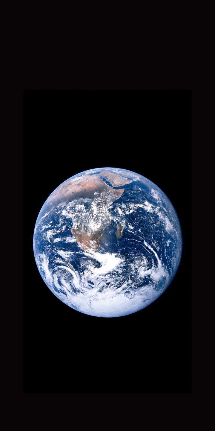 The vibrant blue hues of our home planet, featuring clear views of Africa and swirling white cloud patterns, shine brightly against the deep black canvas of space in this breathtaking 4K wallpaper. It's an iconic and inspiring wallpaper, perfect for your iPhone screen. | space earth planet earth iphone wallpaper mobile 4k wallpaper hd wallpaper astronomy epic cosmos blue marble The vibrant blue hues of our home planet, featuring clear views of Africa and swirling white cloud patterns, shine brightly against the deep black canvas of space in this breathtaking 4K wallpaper. It's an iconic and inspiring wallpaper, perfect for your iPhone screen.