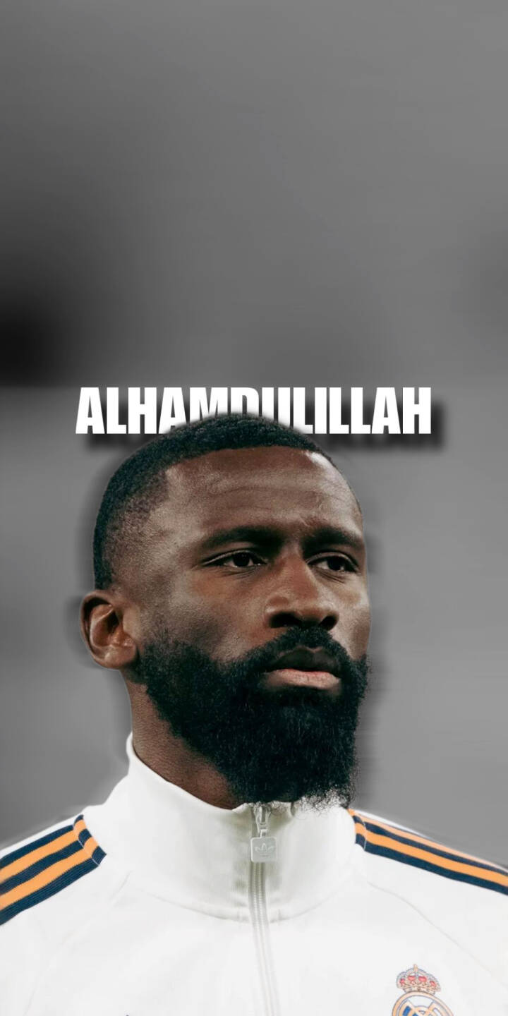 The prominent "ALHAMDULILLAH" text overlays Antonio Rüdiger's focused expression in this striking 4K wallpaper, featuring his distinct dark beard and white Real Madrid kit—a perfect wallpaper for iPhone users. | football iphone real madrid wallpaper mobile 4k wallpaper hd wallpaper rudiger alhamdullilah bearded islamic antonio rudiger The prominent "ALHAMDULILLAH" text overlays Antonio Rüdiger's focused expression in this striking 4K wallpaper, featuring his distinct dark beard and white Real Madrid kit—a perfect wallpaper for iPhone users.