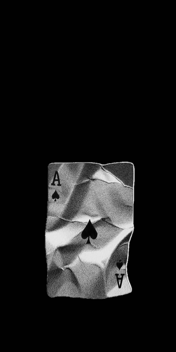 The deep, intricate textures of a crumpled Ace of Spades card create a visually striking minimalist monochrome aesthetic in this 4K wallpaper, offering a captivating backdrop for any iPhone screen. This intriguing playing card wallpaper perfectly blends subtlety with symbolic power. | iphone minimalist gaming wallpaper mobile 4k wallpaper hd wallpaper dark aesthetic monochrome ace of spades playing card crumpled card The deep, intricate textures of a crumpled Ace of Spades card create a visually striking minimalist monochrome aesthetic in this 4K wallpaper, offering a captivating backdrop for any iPhone screen. This intriguing playing card wallpaper perfectly blends subtlety with symbolic power.