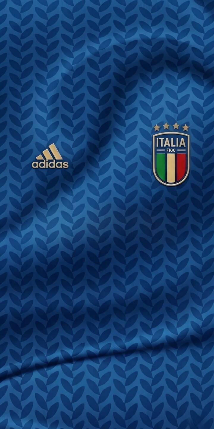 The vibrant deep blue of the Italy national team jersey comes alive with a subtle leaf-patterned texture, elegantly featuring the golden Adidas logo and the iconic FIGC crest with its four stars in this stunning 4K wallpaper, making it a perfect sports wallpaper for iPhone. | football blue iphone soccer adidas wallpaper jersey mobile italy 4k wallpaper hd wallpaper azzurri The vibrant deep blue of the Italy national team jersey comes alive with a subtle leaf-patterned texture, elegantly featuring the golden Adidas logo and the iconic FIGC crest with its four stars in this stunning 4K wallpaper, making it a perfect sports wallpaper for iPhone.