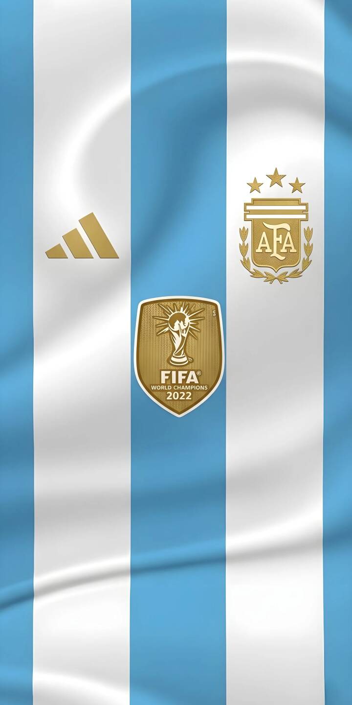 The gleaming gold FIFA World Champions 2022 badge proudly sits amidst the iconic light blue and white stripes, flanked by the Adidas and AFA logos, in this commemorative 4K wallpaper; a perfect Argentina football wallpaper for iPhone screens. | football iphone messi argentina wallpaper champions jersey mobile 4k wallpaper hd wallpaper fifa world cup The gleaming gold FIFA World Champions 2022 badge proudly sits amidst the iconic light blue and white stripes, flanked by the Adidas and AFA logos, in this commemorative 4K wallpaper; a perfect Argentina football wallpaper for iPhone screens.