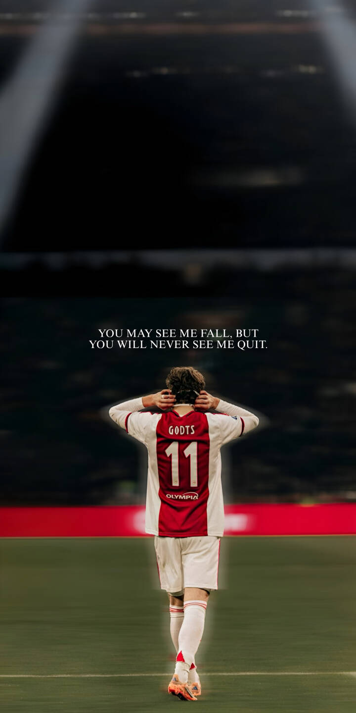 The powerful quote 'YOU MAY SEE ME FALL. BUT YOU WILL NEVER SEE ME QUIT.' inspires from above Mika Godts, seen from behind in his iconic number 11 Ajax jersey, in this compelling 4K wallpaper ", an ideal inspirational wallpaper for iPhone. | sports football stadium quote iphone wallpaper mobile 4k wallpaper hd wallpaper ajax inspirational mika godts The powerful quote 'YOU MAY SEE ME FALL. BUT YOU WILL NEVER SEE ME QUIT.' inspires from above Mika Godts, seen from behind in his iconic number 11 Ajax jersey, in this compelling 4K wallpaper ", an ideal inspirational wallpaper for iPhone.