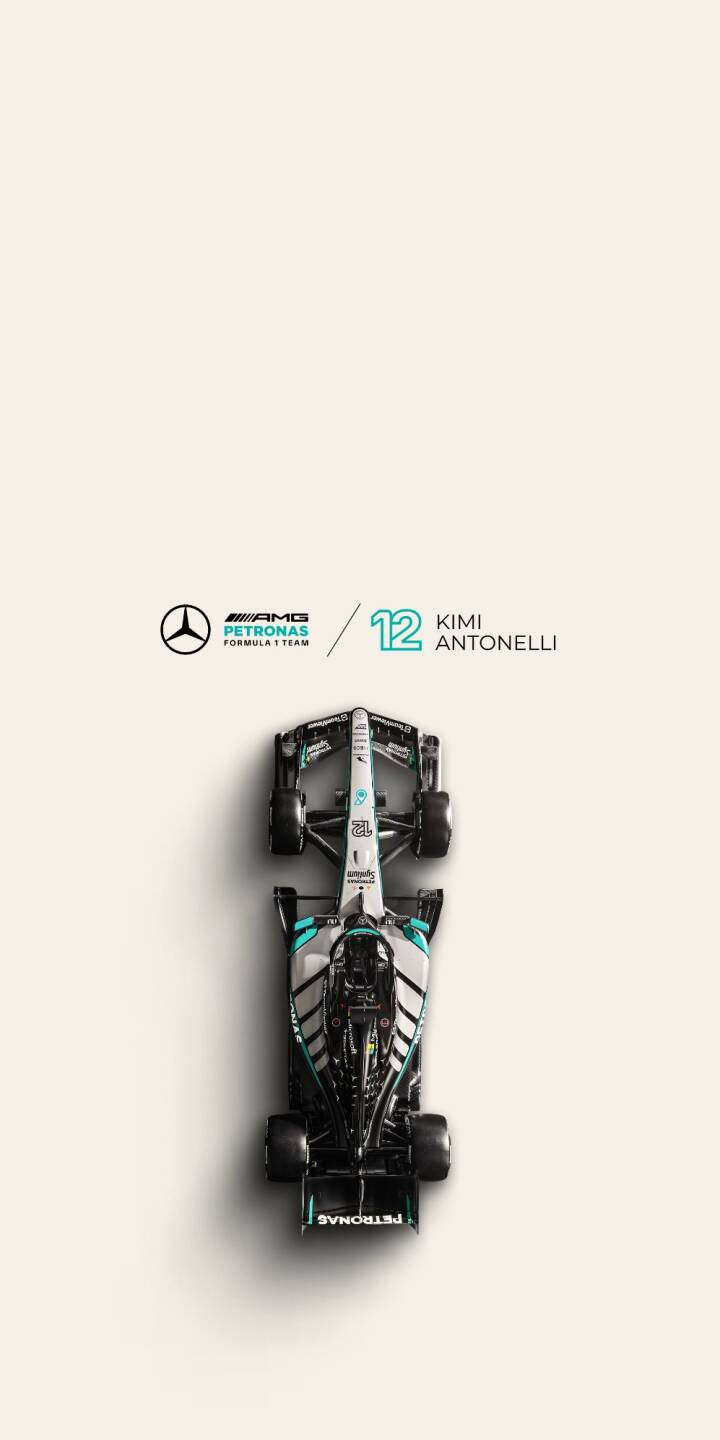 The pristine white and teal livery of Kimi Antonelli's Mercedes-AMG F1 car gleams under an overhead light in this stunning 4K wallpaper, making it a sleek, high-detail wallpaper for iPhone motorsport enthusiasts. | iphone minimalist motorsport wallpaper f1 formula one mobile 4k wallpaper hd wallpaper racing car mercedes f1 kimi antonelli The pristine white and teal livery of Kimi Antonelli's Mercedes-AMG F1 car gleams under an overhead light in this stunning 4K wallpaper, making it a sleek, high-detail wallpaper for iPhone motorsport enthusiasts.