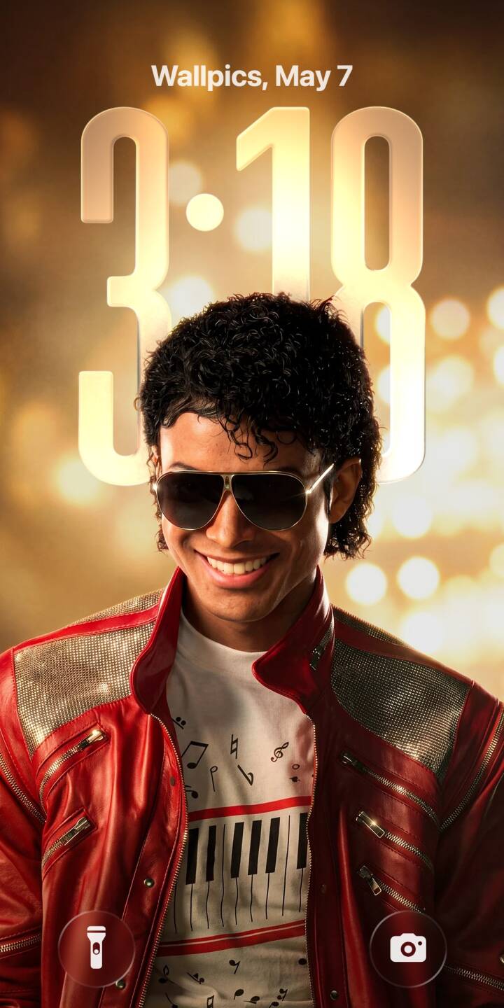 A broad smile lights up this stunning 4K wallpaper featuring an iconic Michael Jackson tribute, sporting a vibrant red leather jacket and stylish aviator sunglasses. The retro white t-shirt with a piano keyboard design adds a perfect musical touch, making it an essential wallpaper for any iPhone user and fan of the pop legend. | iphone wallpaper red jacket mj mobile 4k wallpaper hd wallpaper 80s iconic michael jackson king of pop pop music A broad smile lights up this stunning 4K wallpaper featuring an iconic Michael Jackson tribute, sporting a vibrant red leather jacket and stylish aviator sunglasses. The retro white t-shirt with a piano keyboard design adds a perfect musical touch, making it an essential wallpaper for any iPhone user and fan of the pop legend.