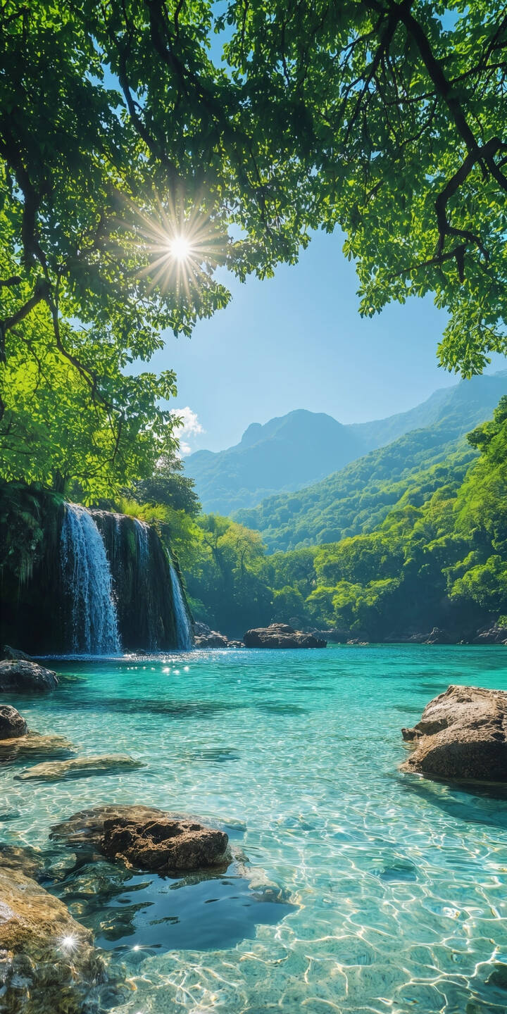 The brilliant sunburst shines through vibrant green foliage, illuminating the breathtaking scene where a pristine waterfall cascades into crystal-clear turquoise waters. This stunning 4K landscape wallpaper is a perfect serene nature wallpaper for iPhone. | landscape iphone waterfall nature wallpaper mobile sunny 4k wallpaper hd wallpaper turquoise water serene lush forest The brilliant sunburst shines through vibrant green foliage, illuminating the breathtaking scene where a pristine waterfall cascades into crystal-clear turquoise waters. This stunning 4K landscape wallpaper is a perfect serene nature wallpaper for iPhone.