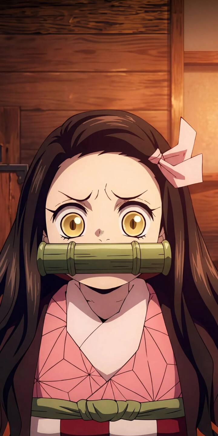 Nezuko's wide, golden eyes show surprise as she wears her iconic bamboo muzzle and pink geometric-patterned kimono in this vibrant 4K wallpaper — a charming wallpaper for iPhone users. | anime cute iphone wallpaper demon slayer nezuko mobile nezuko kamado 4k wallpaper hd wallpaper bamboo muzzle kimetsu no yaiba pfp Nezuko's wide, golden eyes show surprise as she wears her iconic bamboo muzzle and pink geometric-patterned kimono in this vibrant 4K wallpaper — a charming wallpaper for iPhone users.