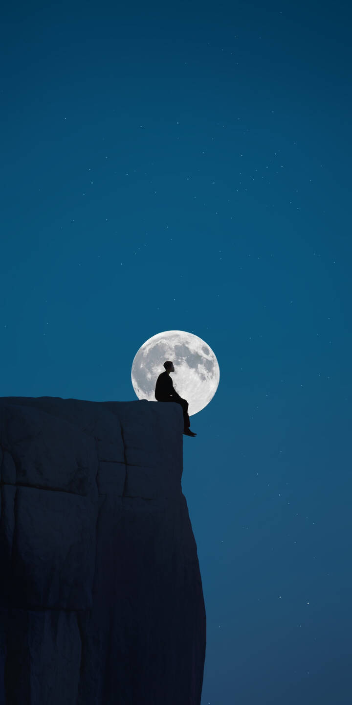 The radiant full moon dominates the deep blue night sky as a lone figure sits in silhouette on a rugged cliff edge, creating a stunning 4K wallpaper for iPhone. This tranquil wallpaper captures a moment of quiet contemplation under the stars. | night moon cliff iphone minimalist wallpaper silhouette mobile solitude 4k wallpaper hd wallpaper serene The radiant full moon dominates the deep blue night sky as a lone figure sits in silhouette on a rugged cliff edge, creating a stunning 4K wallpaper for iPhone. This tranquil wallpaper captures a moment of quiet contemplation under the stars.