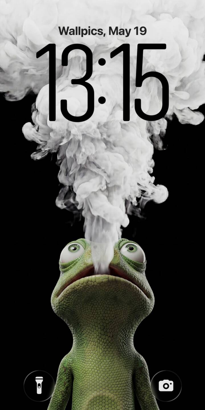 A dramatic plume of white smoke erupts from the nose of a wide-eyed green chameleon, set against a stark black background in this striking 4K wallpaper—a truly unique wallpaper for your iPhone. | cartoon funny lizard smoke iphone minimalist wallpaper mobile 4k wallpaper hd wallpaper reptile chameleon A dramatic plume of white smoke erupts from the nose of a wide-eyed green chameleon, set against a stark black background in this striking 4K wallpaper—a truly unique wallpaper for your iPhone.