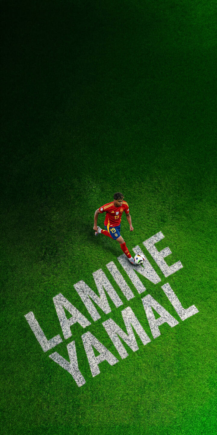 Lamine Yamal elegantly dribbles the football across a vibrant green pitch, his name boldly displayed on the grass in this dynamic 4K wallpaper — an essential football wallpaper for iPhone screens. | football athlete iphone soccer spain wallpaper yamal lamine yamal mobile green field 4k wallpaper hd wallpaper Lamine Yamal elegantly dribbles the football across a vibrant green pitch, his name boldly displayed on the grass in this dynamic 4K wallpaper — an essential football wallpaper for iPhone screens.