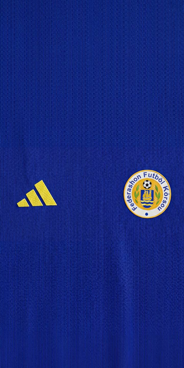 Show your support for Curaçao at the FIFA World Cup 2026™ with this stunning 4K iPhone wallpaper. Crafted from the official Curaçao home jersey texture, this wallpaper captures the true spirit of one of the 48 nations competing on the world's biggest stage. Perfect for fans heading into the tournament. | football blue iphone team adidas wallpaper jersey mobile 4k wallpaper hd wallpaper 2026 fifa world cup fifa world cup ffk fifa world cup 2026 world cup 2026 fifa 2026 jersey 2026 curaçao curacao Show your support for Curaçao at the FIFA World Cup 2026™ with this stunning 4K iPhone wallpaper. Crafted from the official Curaçao home jersey texture, this wallpaper captures the true spirit of one of the 48 nations competing on the world's biggest stage. Perfect for fans heading into the tournament.
