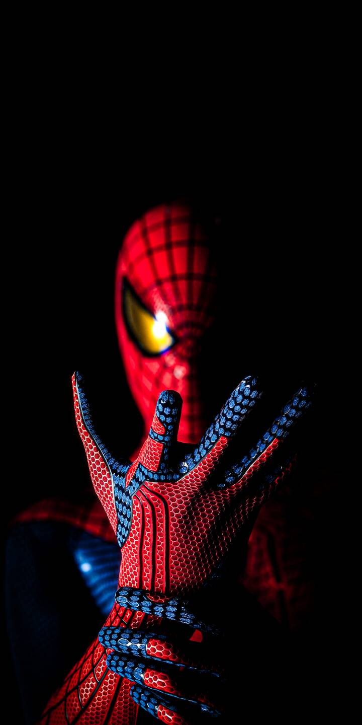 Spider-Man's iconic yellow eyes glow intensely as his web-patterned hand reaches out from a pitch-black background in this dramatic 4K wallpaper. It's the perfect wallpaper for iPhone users looking for a heroic lock screen. | dark superhero marvel spiderman iphone wallpaper mobile 4k wallpaper hd wallpaper glowing eyes spider-man Spider-Man's iconic yellow eyes glow intensely as his web-patterned hand reaches out from a pitch-black background in this dramatic 4K wallpaper. It's the perfect wallpaper for iPhone users looking for a heroic lock screen.