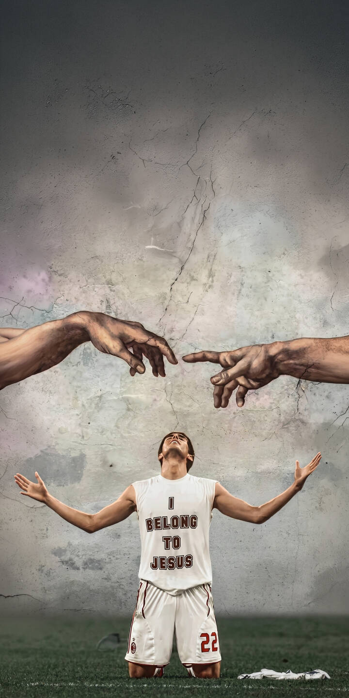 Inspired by a classic art masterpiece, Kaka kneels on a vibrant football pitch, arms wide, looking up at the iconic hands of creation in this powerful 4K wallpaper. This deeply devotional Kaka wallpaper, featuring his 'I BELONG TO JESUS' kit, is a perfect faith-filled backdrop for iPhone. | football iphone soccer wallpaper christian mobile kaka 4k wallpaper hd wallpaper inspirational devotional creationofadam Inspired by a classic art masterpiece, Kaka kneels on a vibrant football pitch, arms wide, looking up at the iconic hands of creation in this powerful 4K wallpaper. This deeply devotional Kaka wallpaper, featuring his 'I BELONG TO JESUS' kit, is a perfect faith-filled backdrop for iPhone.