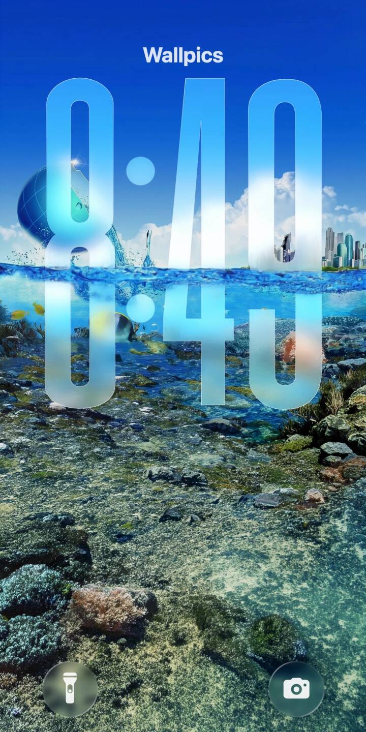 Water cascades from a vibrant blue globe into a serene ocean, revealing a lively underwater world and a distant city skyline in this stunning Frutiger Aero 4K conceptual art wallpaper. This dynamic wallpaper, featuring a colorful butterflyfish and textured seabed, is perfect for your iPhone. | blue underwater iphone fantasy ocean wallpaper futuristic mobile frutiger aero 4k wallpaper hd wallpaper globe concept art cityscape windowsxp Water cascades from a vibrant blue globe into a serene ocean, revealing a lively underwater world and a distant city skyline in this stunning Frutiger Aero 4K conceptual art wallpaper. This dynamic wallpaper, featuring a colorful butterflyfish and textured seabed, is perfect for your iPhone.