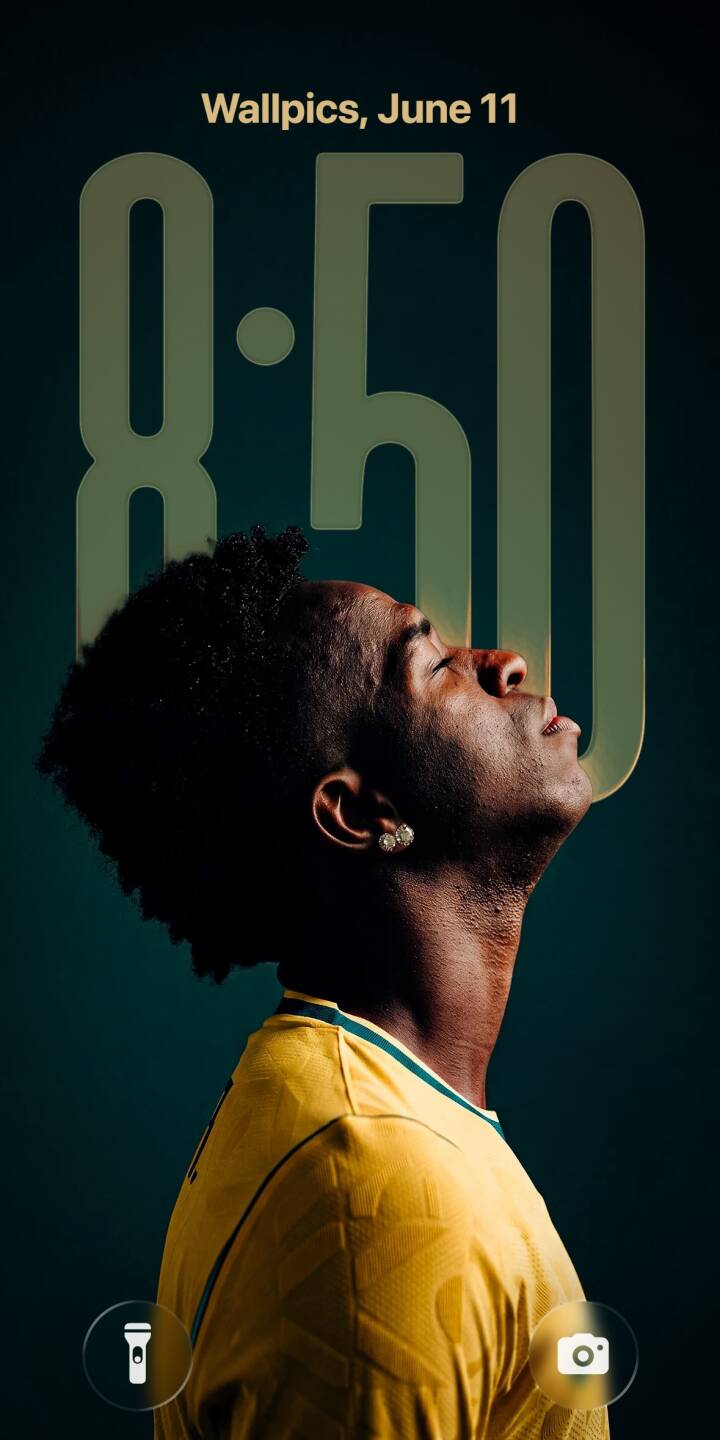 Vinicius Jr's pensive gaze captures the moment, head tilted back against a dark teal background in this striking 4K wallpaper. This powerful side profile wallpaper for iPhone fans showcases his iconic yellow Brazil jersey and a subtle diamond earring. | football profile iphone soccer wallpaper vinicius jr mobile 4k wallpaper hd wallpaper vini jr pensive brazil jersey Vinicius Jr's pensive gaze captures the moment, head tilted back against a dark teal background in this striking 4K wallpaper. This powerful side profile wallpaper for iPhone fans showcases his iconic yellow Brazil jersey and a subtle diamond earring.