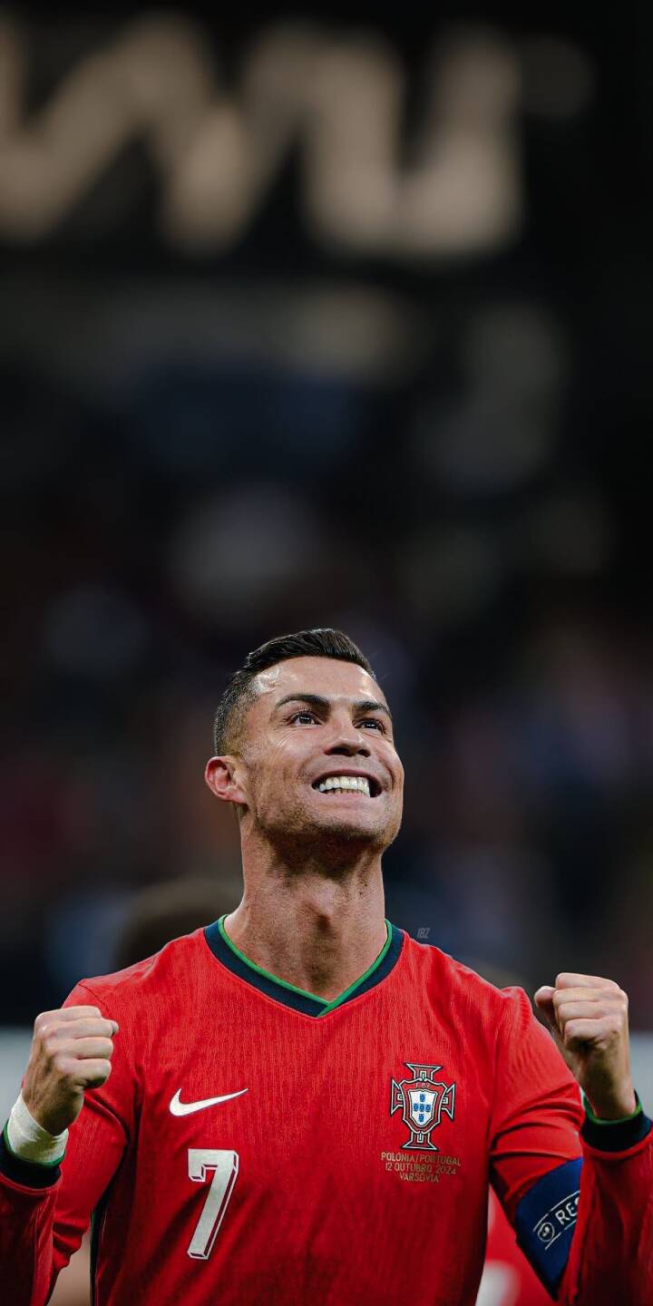 Cristiano Ronaldo's intense celebratory roar fills this stunning 4K wallpaper, capturing his passion in the iconic red Portugal jersey with number 7. This dynamic wallpaper is perfect for any iPhone, displaying the football legend's triumphant moment. | football celebration iphone ronaldo soccer wallpaper cr7 portugal cristiano ronaldo mobile 4k wallpaper hd wallpaper Cristiano Ronaldo's intense celebratory roar fills this stunning 4K wallpaper, capturing his passion in the iconic red Portugal jersey with number 7. This dynamic wallpaper is perfect for any iPhone, displaying the football legend's triumphant moment.