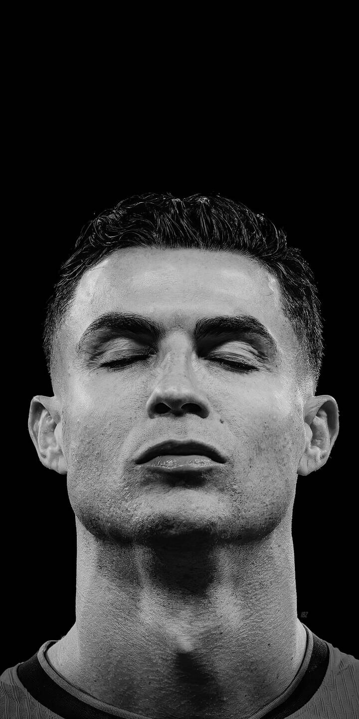 Cristiano Ronaldo's eyes are peacefully closed in this striking monochrome 4K wallpaper, capturing a moment of profound focus. This serene wallpaper is perfect for personalizing your iPhone with a touch of athletic elegance. | football portrait calm iphone ronaldo wallpaper cr7 cristiano ronaldo mobile 4k wallpaper hd wallpaper monochrome Cristiano Ronaldo's eyes are peacefully closed in this striking monochrome 4K wallpaper, capturing a moment of profound focus. This serene wallpaper is perfect for personalizing your iPhone with a touch of athletic elegance.