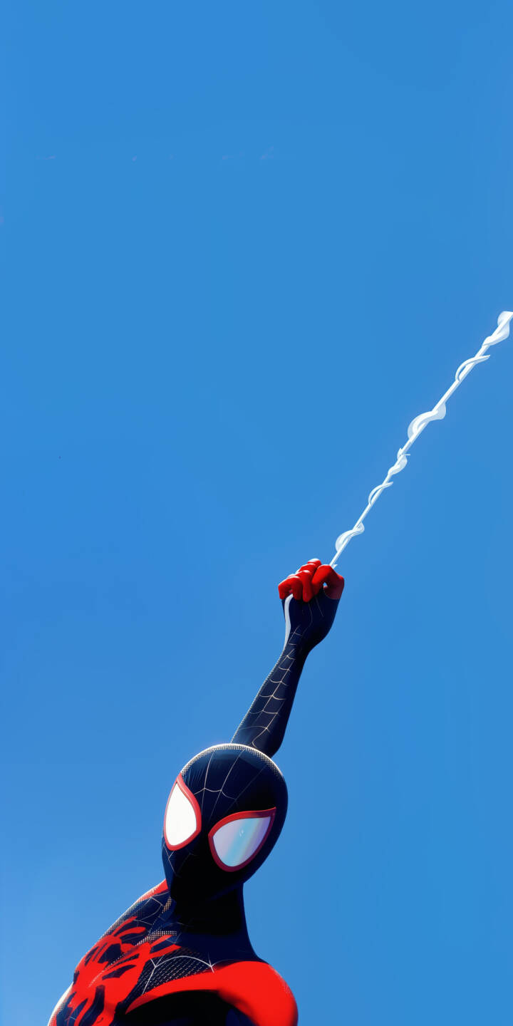 Miles Morales' iconic red fist clenches a web line against a vibrant blue sky, his black and red suit detailed with comic book flair in this dynamic 4K wallpaper. This essential Spider-Man wallpaper is perfect for personalizing your iPhone. | superhero marvel iphone wallpaper miles morales blue sky mobile 4k wallpaper hd wallpaper spider-verse spider-man web swing Miles Morales' iconic red fist clenches a web line against a vibrant blue sky, his black and red suit detailed with comic book flair in this dynamic 4K wallpaper. This essential Spider-Man wallpaper is perfect for personalizing your iPhone.