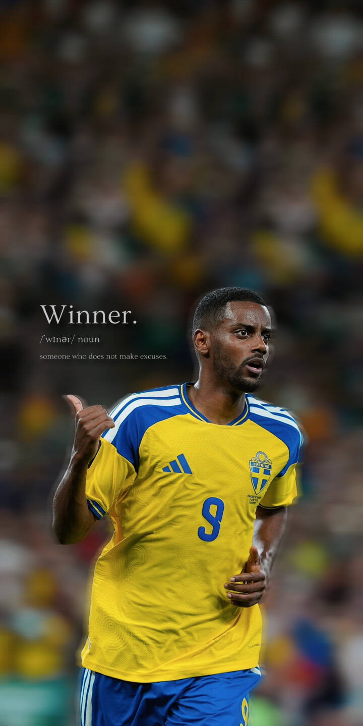 The impactful quote "Winner." boldly frames this dynamic 4K wallpaper featuring Alexander Isak in his iconic yellow and blue Sweden jersey, caught mid-action with a focused expression. This inspiring football wallpaper is a perfect fit for iPhone screens, celebrating excellence and determination. | sports football athlete motivational iphone wallpaper mobile 4k wallpaper hd wallpaper sweden alexander isak winner quote The impactful quote "Winner." boldly frames this dynamic 4K wallpaper featuring Alexander Isak in his iconic yellow and blue Sweden jersey, caught mid-action with a focused expression. This inspiring football wallpaper is a perfect fit for iPhone screens, celebrating excellence and determination.