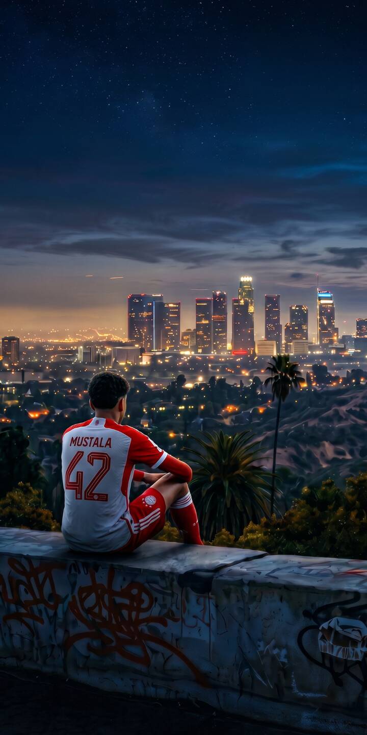 The sprawling lights of the Los Angeles cityscape glow brilliantly beneath a starry twilight sky, forming a breathtaking 4K wallpaper. A player in a 'MUSTALA 42' jersey sits contemplatively on a graffiti-covered wall, offering an inspiring and aesthetic mobile wallpaper for iPhone. | football player night los angeles iphone stars wallpaper mobile 4k wallpaper hd wallpaper urban aesthetic cityscape mustala The sprawling lights of the Los Angeles cityscape glow brilliantly beneath a starry twilight sky, forming a breathtaking 4K wallpaper. A player in a 'MUSTALA 42' jersey sits contemplatively on a graffiti-covered wall, offering an inspiring and aesthetic mobile wallpaper for iPhone.