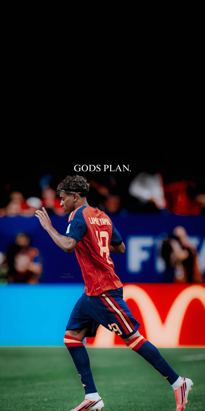 With the inspirational "GODS PLAN." text overhead, Lamine Yamal sprints purposefully in his national kit across the vibrant green pitch in this stunning 4K wallpaper ", an essential iPhone wallpaper for any football enthusiast. | sports football iphone soccer spain dynamic wallpaper lamine yamal mobile 4k wallpaper hd wallpaper gods plan With the inspirational "GODS PLAN." text overhead, Lamine Yamal sprints purposefully in his national kit across the vibrant green pitch in this stunning 4K wallpaper ", an essential iPhone wallpaper for any football enthusiast.